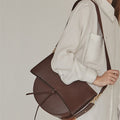 Solid color single shoulder half moon bag